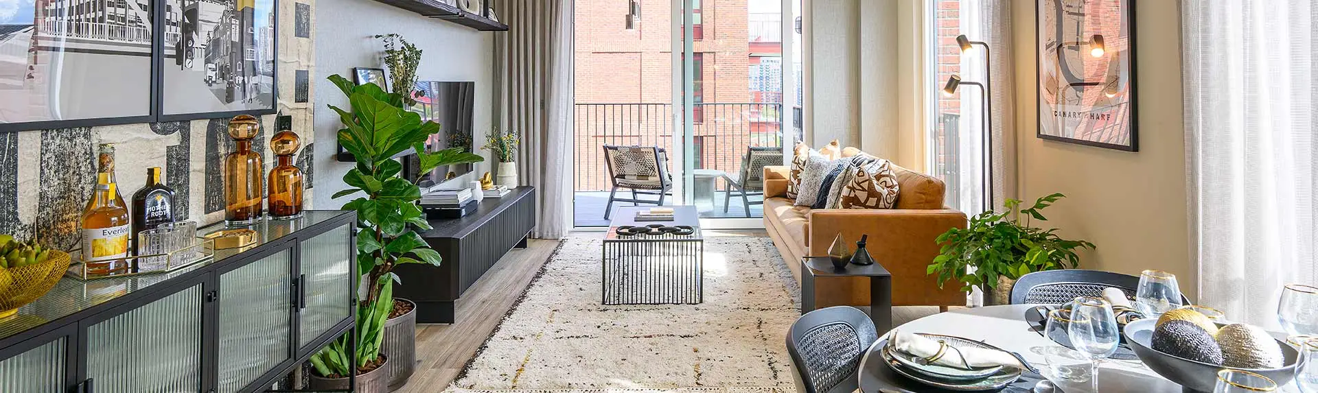 Bright and airy open-plan living and dining space at Heron Wharf